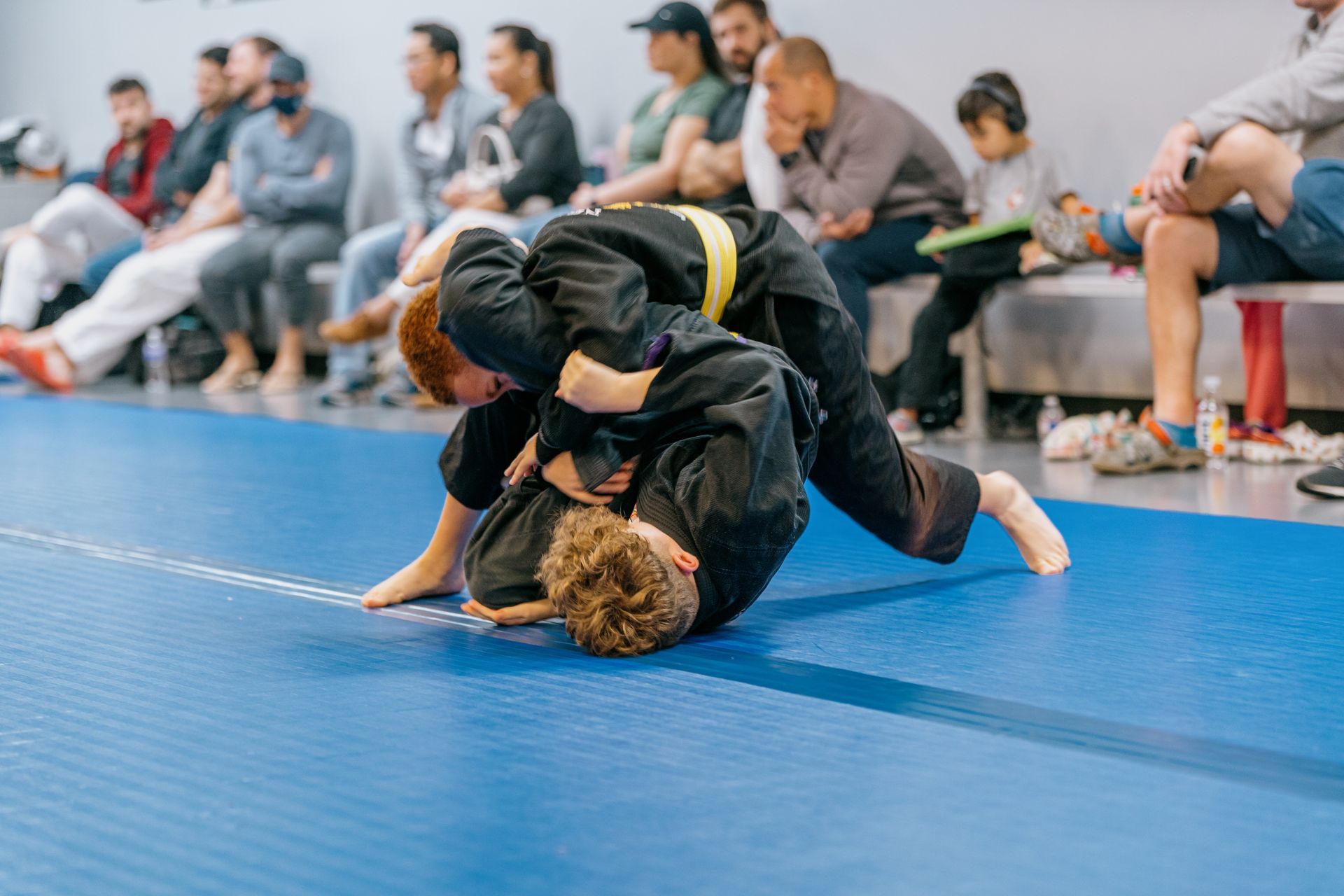 Students rolling during live training
